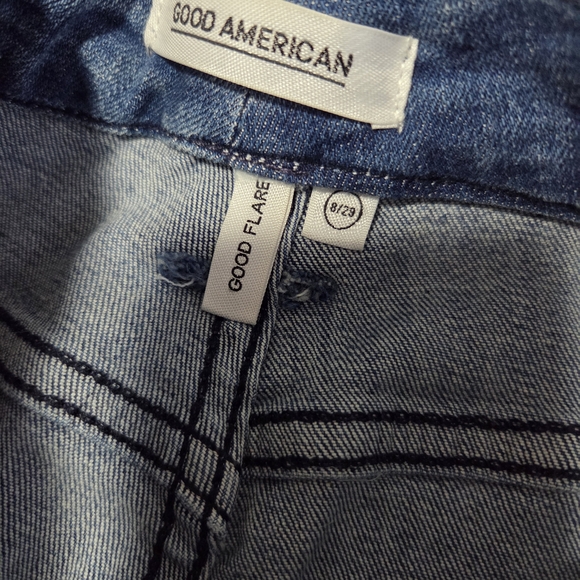 Good American Blue Flare Jeans with Knee Distress - Picture 3 of 3